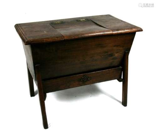 An 18th / 19th century elm dough bin on stand, 102cms (40ins) wide.