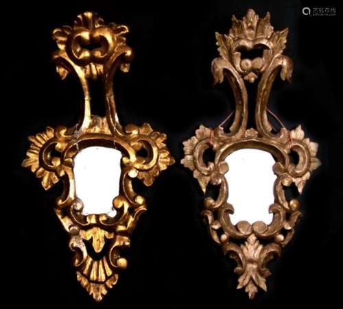 Two carved gilt wood mirrors, each 48cms (19ins) high.Condition Report Loss and damages to both,