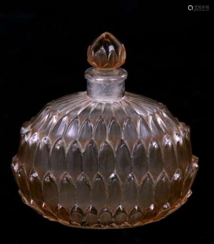 An R Lalique glass scent bottle ‘Amelie’, of squat ovoid form, overlapping vertical leaves with