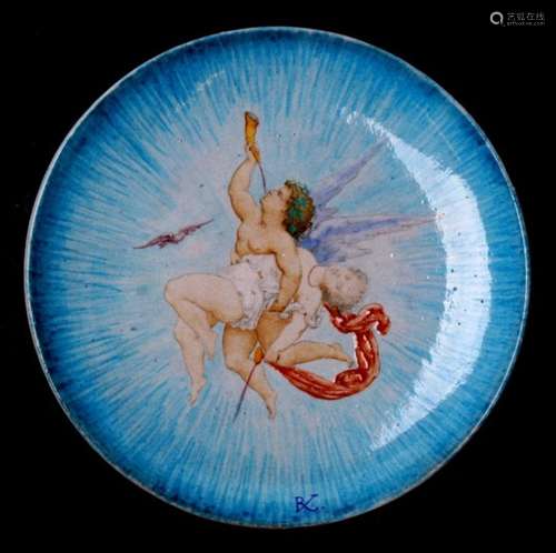 A Theodore Deck ceramic dish decorated with an angel and maiden, initialled 'TD' and numbered 1861