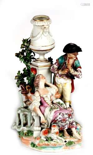 A 19th century Derby style porcelain group depicting a young musician beside a seated young woman,