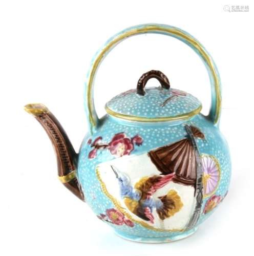 A 19th century continental majolica teapot, in the Aesthetic style with fan and bird decoration,