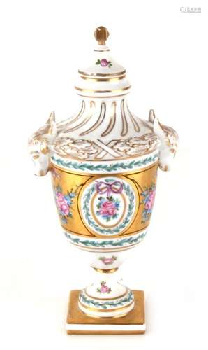 A Carl Thieme Potschappel porcelain urn hand painted with flowers and swags, decorated with rams