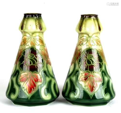 A pair of Royal Bonn Art Nouveau tube lined tulip bulb vases, shape number 273, decorated in various