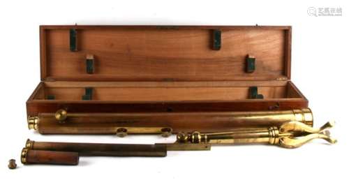 A large Victorian brass telescope on folding tripod stand, housed in a mahogany carry box, the box