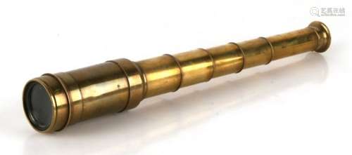 A five drawer brass pocket telescope.