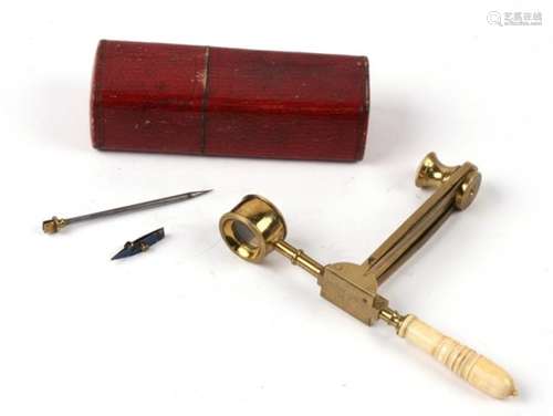 A early 19th century folding field entomologists microscope with turned ivory handle, with tools and