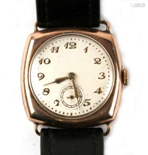 A 9ct gold cushion shape wristwatch.