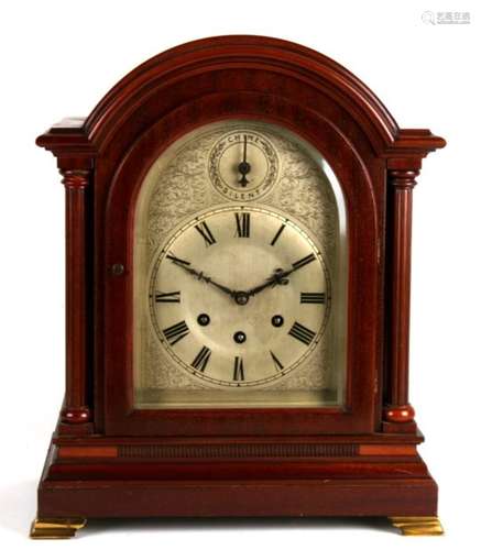 An early 20th century three-train bracket clock, the silvered dial with Roman numerals, in a