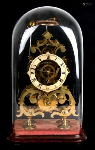 A brass skeleton clock with passing strike on a bell, eight day fusee movement. Velvet covered