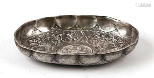 A white metal oval dish with central dragon and double headed eagle decoration. 16.5cm (6.5ins)