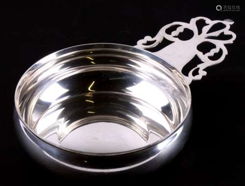 A Tiffany and Co silver porringer with pierced handle, a reproduction of the original by Paul Revere