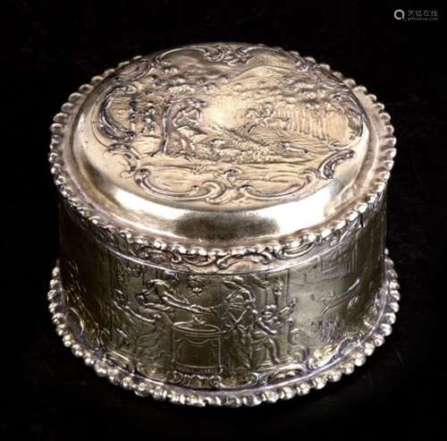 A Late 19th century continental silver gilt dressing table box decorated with images of country