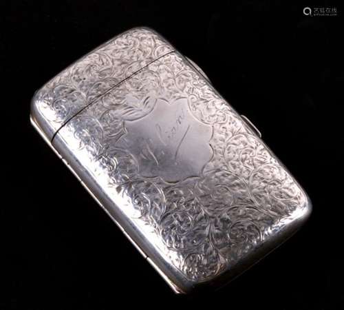 An Edwardian leaf and scroll engraved silver combination cigarette and vesta case. Birmingham