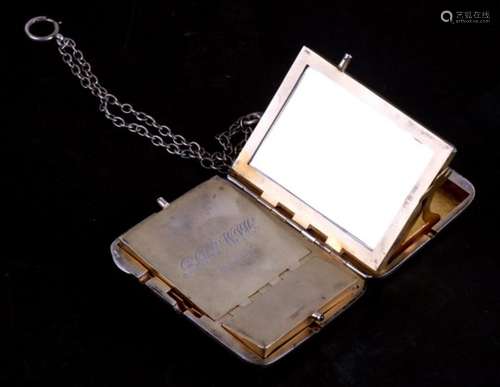 An Edwardian planished silver minaudiere, comprising aide memoire with pencil, card case, mirror,