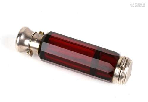 A silver mounted (unmarked but tested) cranberry glass combination scent bottle and vinaigrette, one