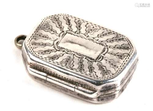 A silver vinaigrette of octagonal form, engraved with a sunburst pattern to the lid and leaves to