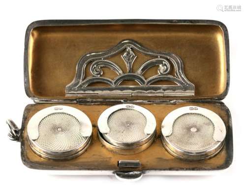 A silver triple sovereign case with spring loaded paper money clip to lid, Chester 1912, makers mark