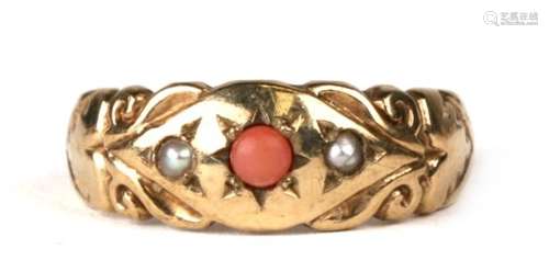 An Edwardian 9ct gold coral and pearl set gypsy ring, approx UK size 'O'.