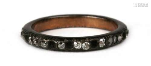 A Berlin Ironwork style diamond set eternity ring, approx UK size 'L'.Condition Report Missing eight