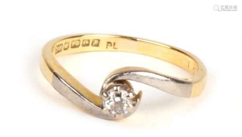 An 18ct gold and platinum diamond solitaire ring. Approx UK size H