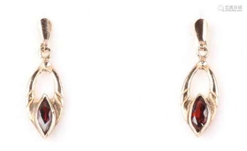 A pair of 9ct gold garnet earrings.