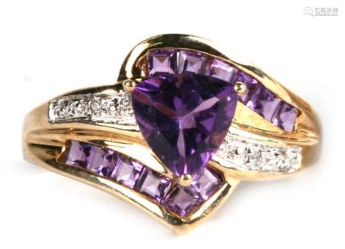 A large 9ct gold, amethyst and diamond dress ring, 3.1g. Approx. UK size N.