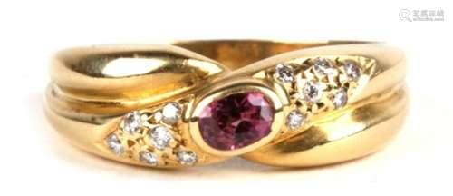 An 18ct gold, ruby & diamond multistone crossover ring, 4.3g. Approx. UK size O.