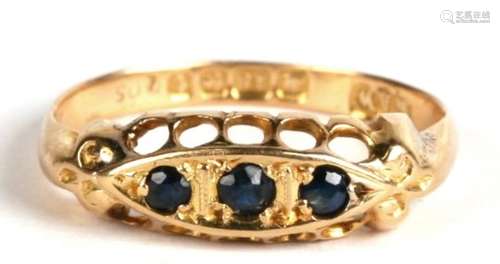 An 18ct gold and sapphire three stone ring, Birmingham 1918, 1.8g. Approx. UK size K.