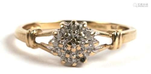 A 9ct gold and diamond cluster ring, 1.5g. Approx. UK size N.