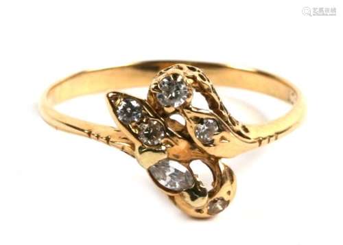 An 18ct gold and six stone diamond ring of naturalistic form, 2.4g. Approx. UK size P.