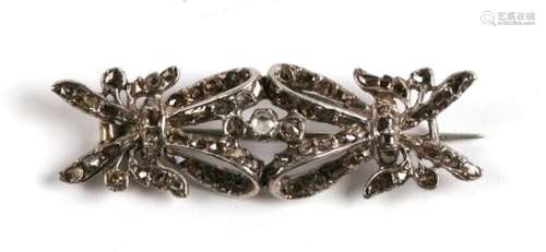 A Continental white metal and old cut diamond bow brooch. 5cm (2 ins) wide.