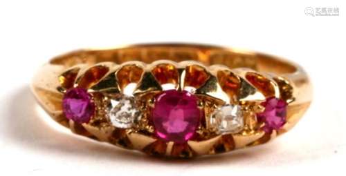 An early 20th century 18ct gold, ruby and diamond five stone ring, Birmingham 1911, 3.9g. Approx. UK