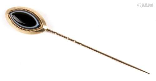 A 19th century 15ct gold (tested) mourning stick pin, set to the head with an oval of black and