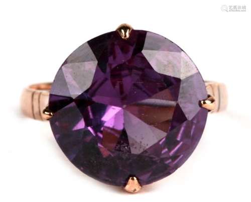 A 14ct gold ring set with a large amethyst, approx UK size 'M'.