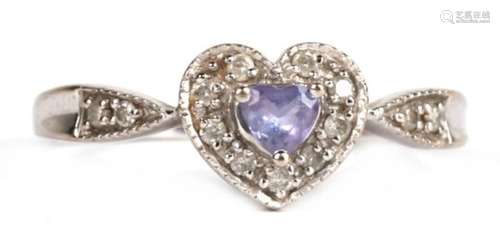 A 9ct white gold amethyst and diamond set heart shaped ring, approx UK size 'V'.