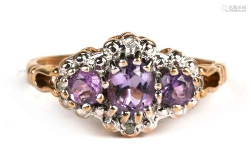 A 9ct gold amethyst and diamond ring, approx UK size 'J'.