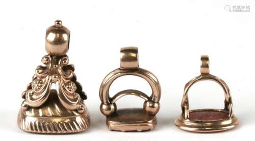 Three antique gold fob seals with carnelian matrix.