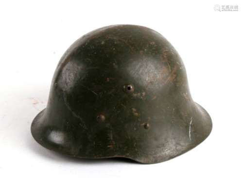 A military tin helmet with leather liner, together with a water bottle.