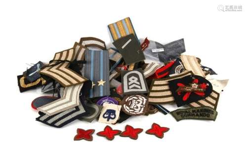 A collection of approximately 100 mainly military cloth badges