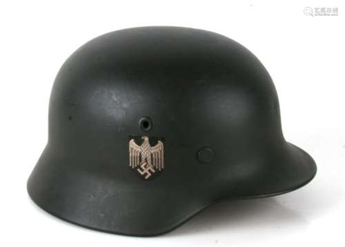 From a private collection, a Third Reich M40 helmet with liner and chin strap, double decals