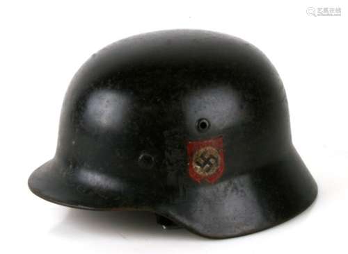 A WW2 Third Reich Waffen SS combat helmet with double decals, liner and chin strap. Makers mark ET64