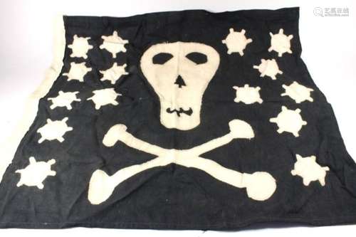 A Minesweeper skull & crossbones flag, named to reverse R.N.P.S. HMS Arley, 65 by 54cms.