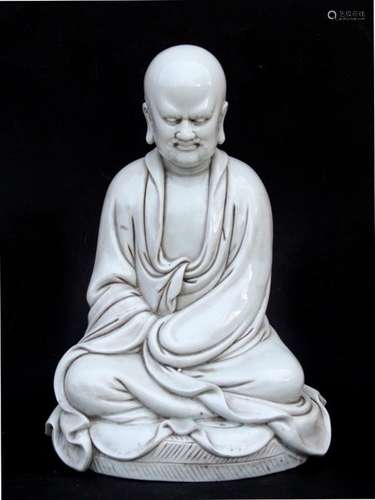 A Chinese Blanc de Chine style figure, depicting a Buddha seated in meditation. 35cm 13.75 high.