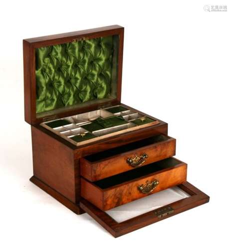 A Victorian figured walnut jewellery casket, the lift-up lid enclosing a fitted interior, above