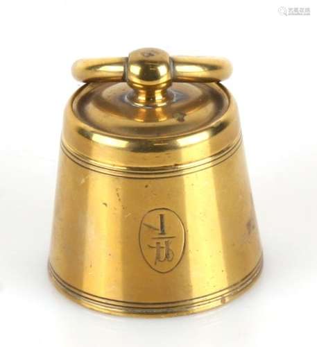 A Victorian novelty inkwell in the form of a brass weight 5.5cm 2.2ins high