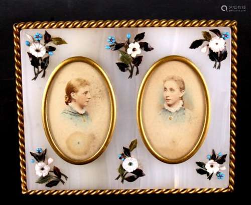 A 19th century gilt metal and onyx double oval picture frame, decorated with applied stone