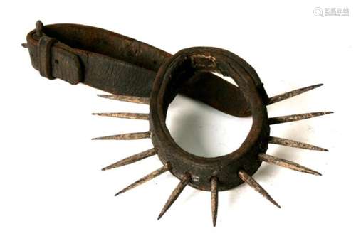 A 19th century spiked leather bear baiting / dog fighting collar with handmade nails and restraining