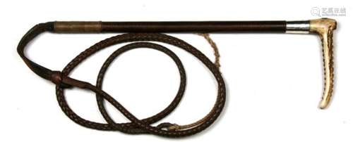 A silver mounted Swaine and Adeney ltd antler handled riding whip with plaited whip. The main body