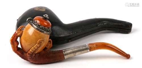 A large Meerschaum pipe carved in the form of a bird’s claw, with silver mounted amber cover and